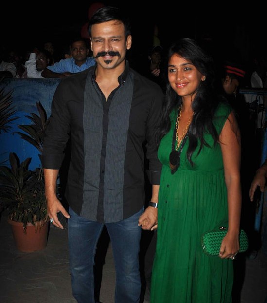 Priyanka Oberoi in Green Deep Neck Gown with Vivek Oberoi at KILL DILL Screening