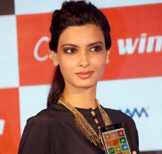 Diana Penty in Black Jumpsuit at Launched Micromax Canvas Phone