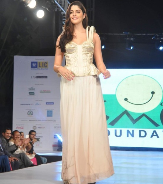 Izabelle Leite  in White Skirt with Short Sleeveless Top at Charity Fashion Show 2014