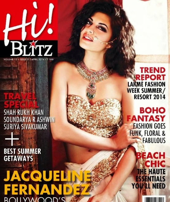 Jecqueline Fernandez Hot in White Saree with Gold Strapless Blouse From Hi Blitz Magazine April 2014 Edition