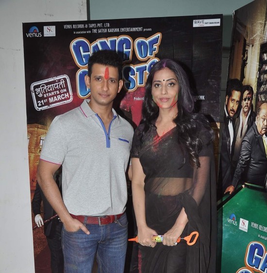 Mahi Gill Hot Navel Show Pics in See Through Black Transparent Saree at Promotion of Gang of Ghosts Movie