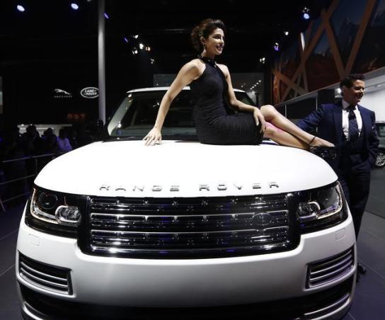 Priyanka Chopra in Black Dress at The Auto Expo 2014 Photos