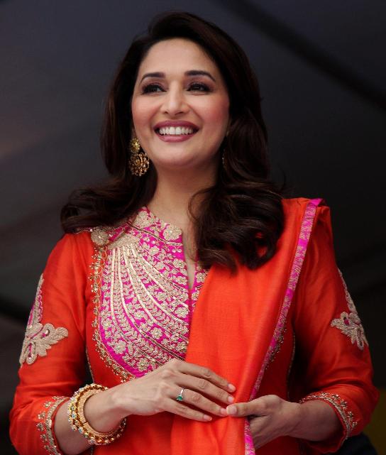 Madhuri Dixit in Orange Suit at Gulaab Gang Music Launched Photos
