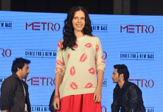 Kalki Koechlin in Mini Red Skirt Photos – Hot Legs Milky Thighs Pics at METRO Shoes Campaign