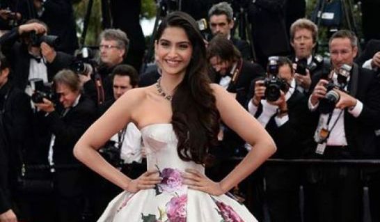 Sonam Kapoor Cannes Film Festival 2013 Photos in Dolce and Gabbana White Floral Dress