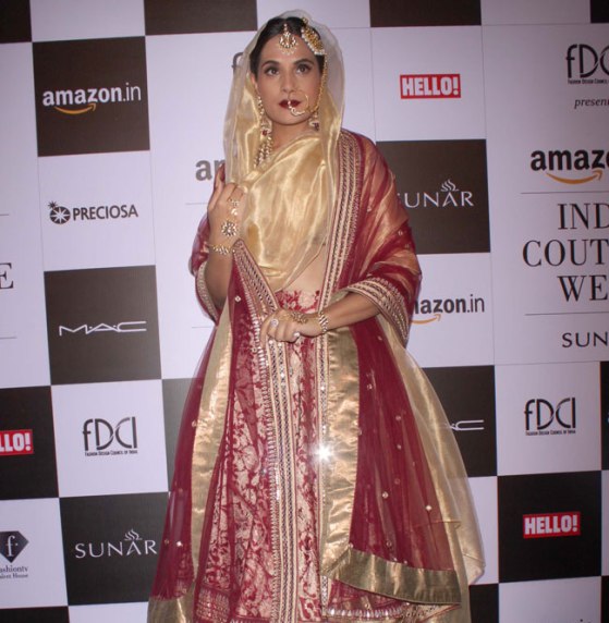 Richa Chadha in Red Cream Lehenga Photos at Amazon India Fashion Week 2015