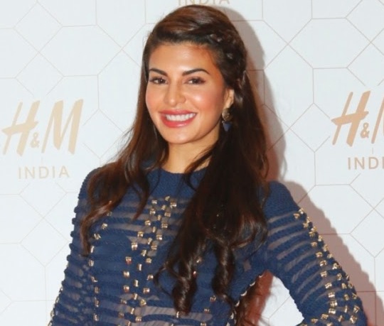 H&M Launch In India Photos 2015 – Jacqueline Fernandez in Red Mini Skirt Shorts Photos